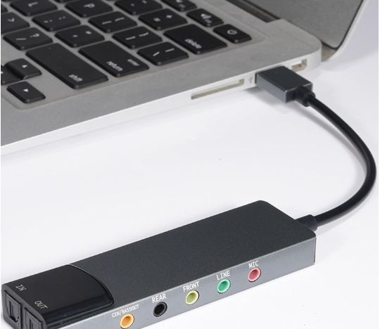 USB sound card connected to a laptop, with Front and Rear audio output jacks visible.